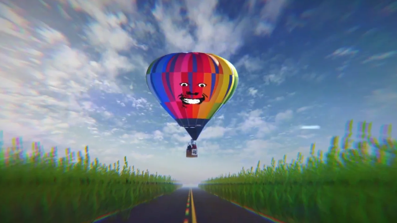 Hot air balloon with a creepy face and a cloudy sky in the background