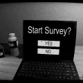 Start Survey laptop on a desk